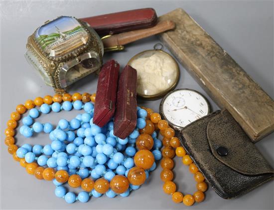 A collection amber cigar holders, an Omega pocket watch etc.